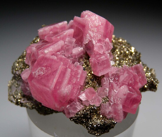 Rhodochrosite on Pyrite