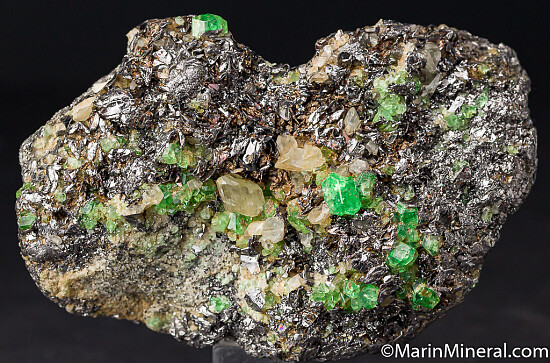 Tsavorite, Diopside, on Graphite