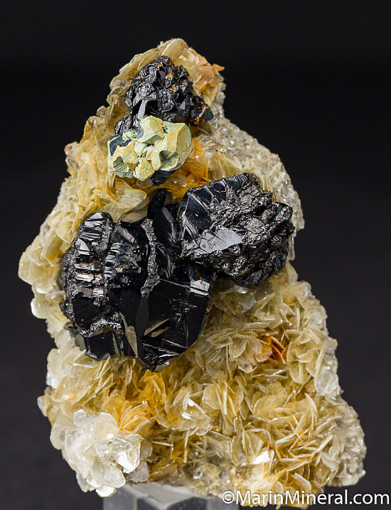Kesterite, Cassiterite on Muscovite