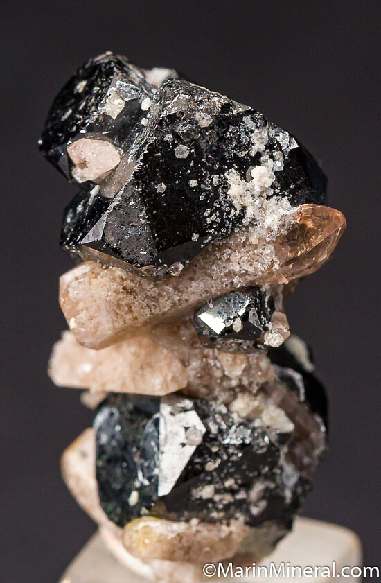 Topaz on Bixbyite