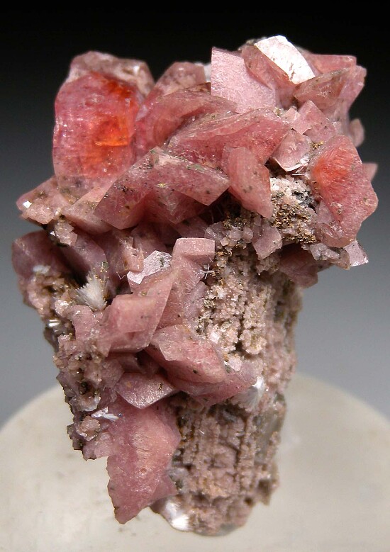 Rhodochrosite on Rhodochrosite after Serandite