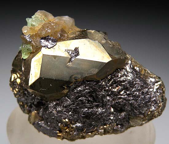 Tsavorite, Diopside, Pyrite on Graphite