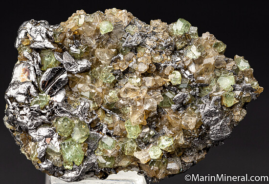 Tsavorite with Diopside on Graphite