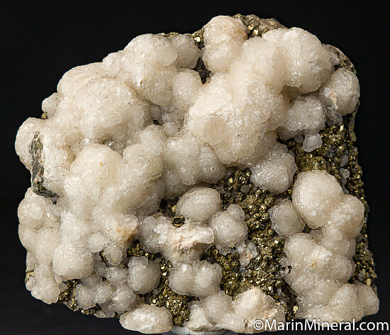 Calcite on Pyrite