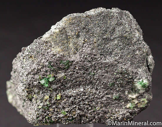 Tsavorite with Pyrite on Graphite