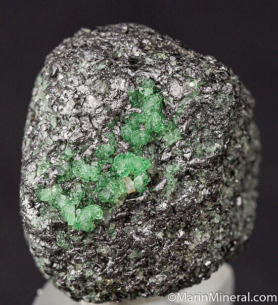 Tsavorite with Pyrite on Graphite