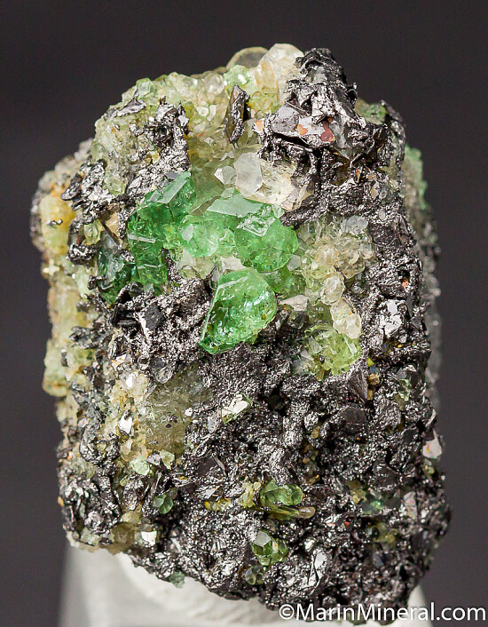 Tsavorite with Diopside on Graphite
