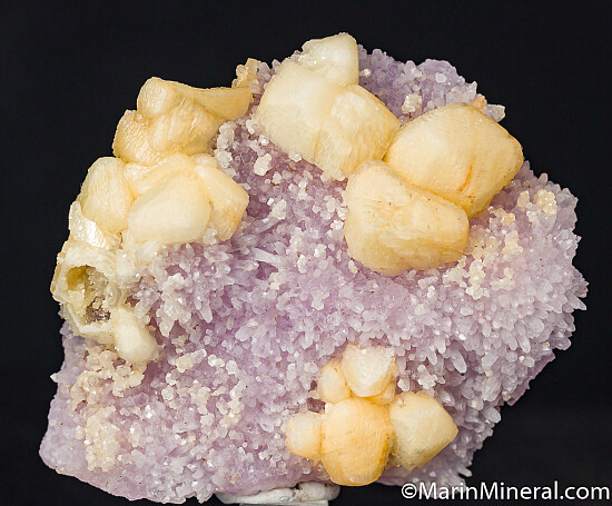 Calcite on Amethyst