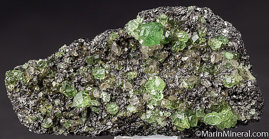 Tsavorite, Diopside on Graphite