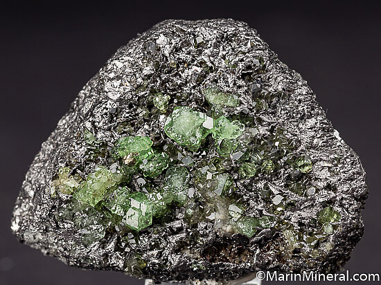 Tsavorite, Pyrite on Graphite