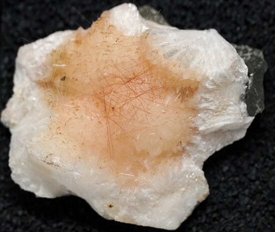 Mesolite on Thompsonite